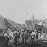 Photograph of people viewing train collision wreckage, Madison County, Georgia, 1910